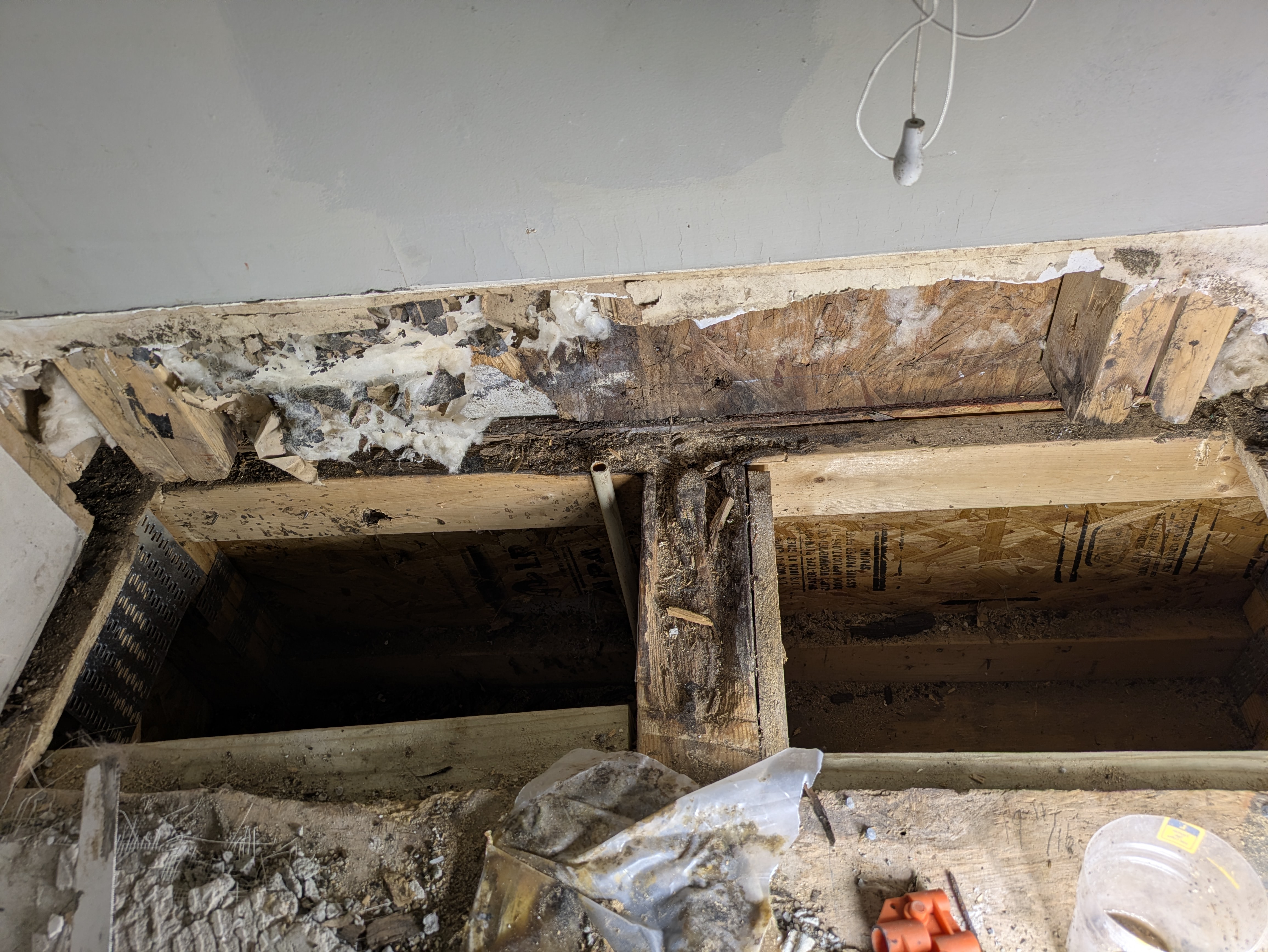 Repairing a structural header over a bathroom door in Athens